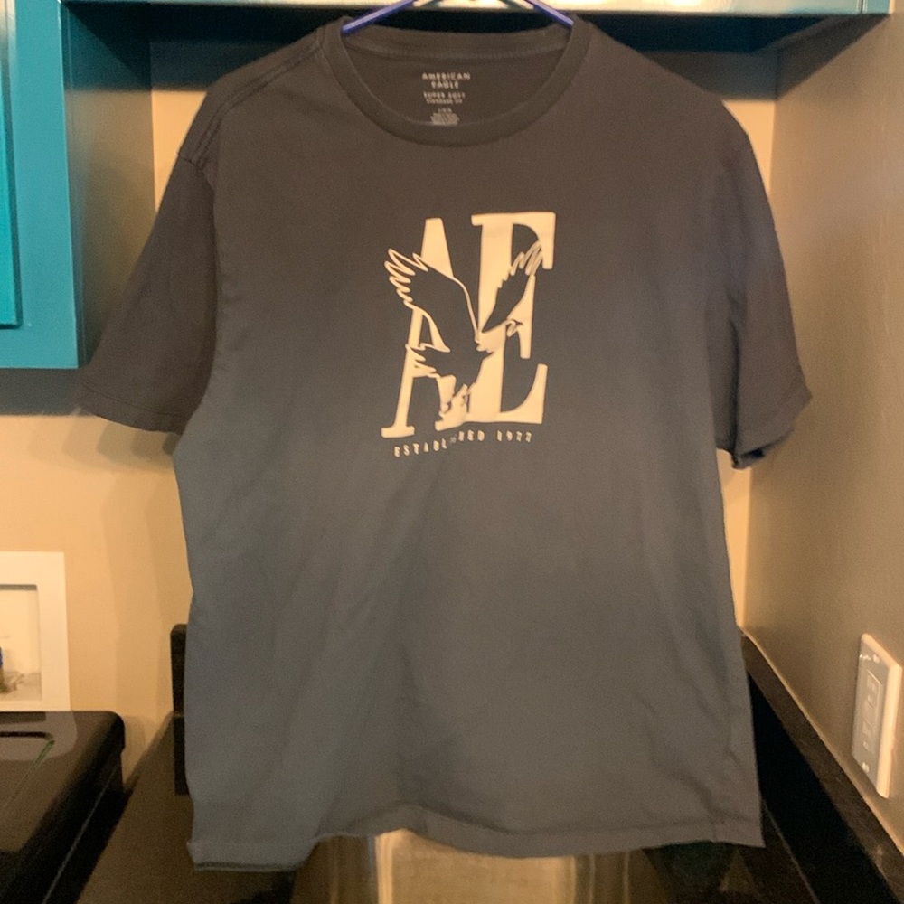 A large American Eagle T-shirt. Faded blue. Super soft.